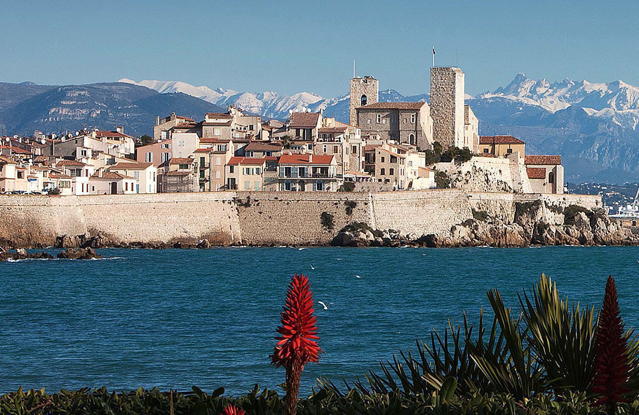 The honey-hued fortress of Antibes, with the snow-capped Alps behind