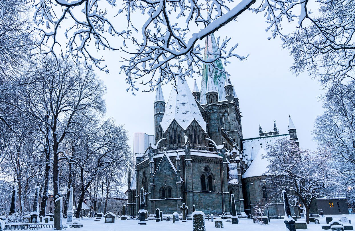 Winter in Trondheim - Nidaros Cathedral from the back, Image copyright Fredrik Ahlsen, Visit Norway